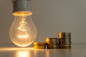 Lightbulb next to money